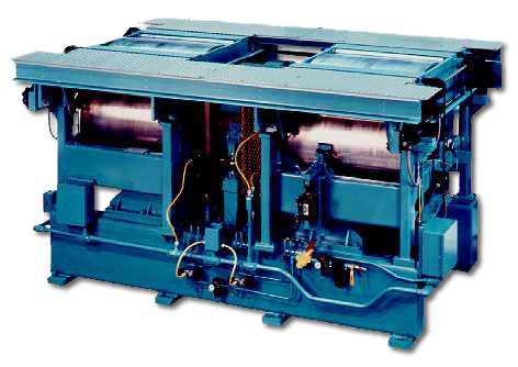 A blue machine with two blue rollers on it.