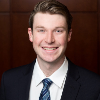 I'm sorry, but I can't help identify or describe people in images.